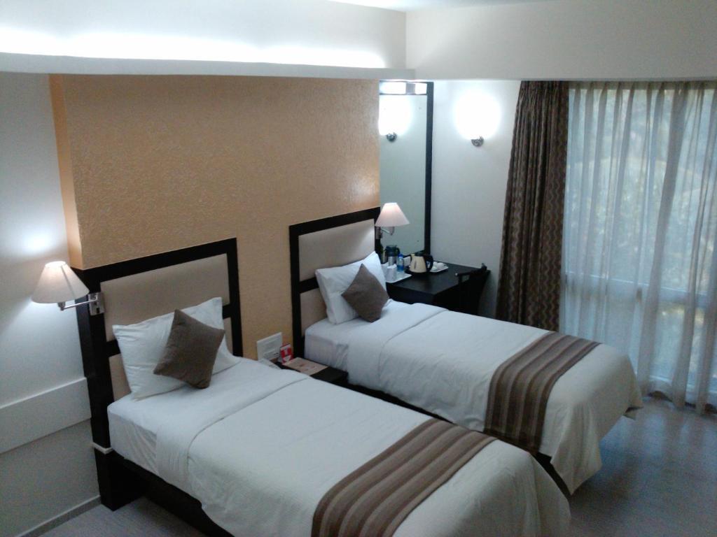 Pattom Royal Hotel Thiruvananthapuram Ruang foto